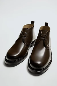 GLOSSY LEATHER BOOTS