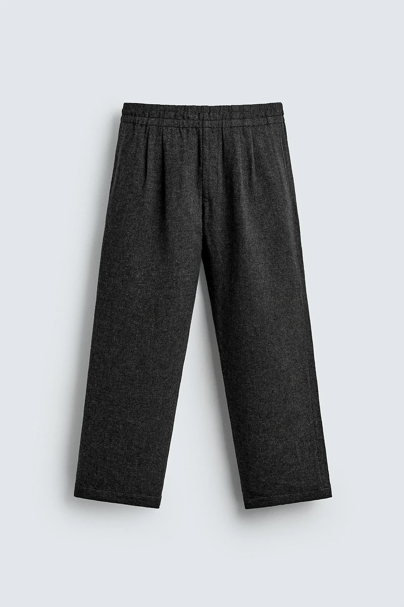 PLEATED WOOL PANTS