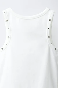 T-SHIRT À CLOUS ET ÉTOILES