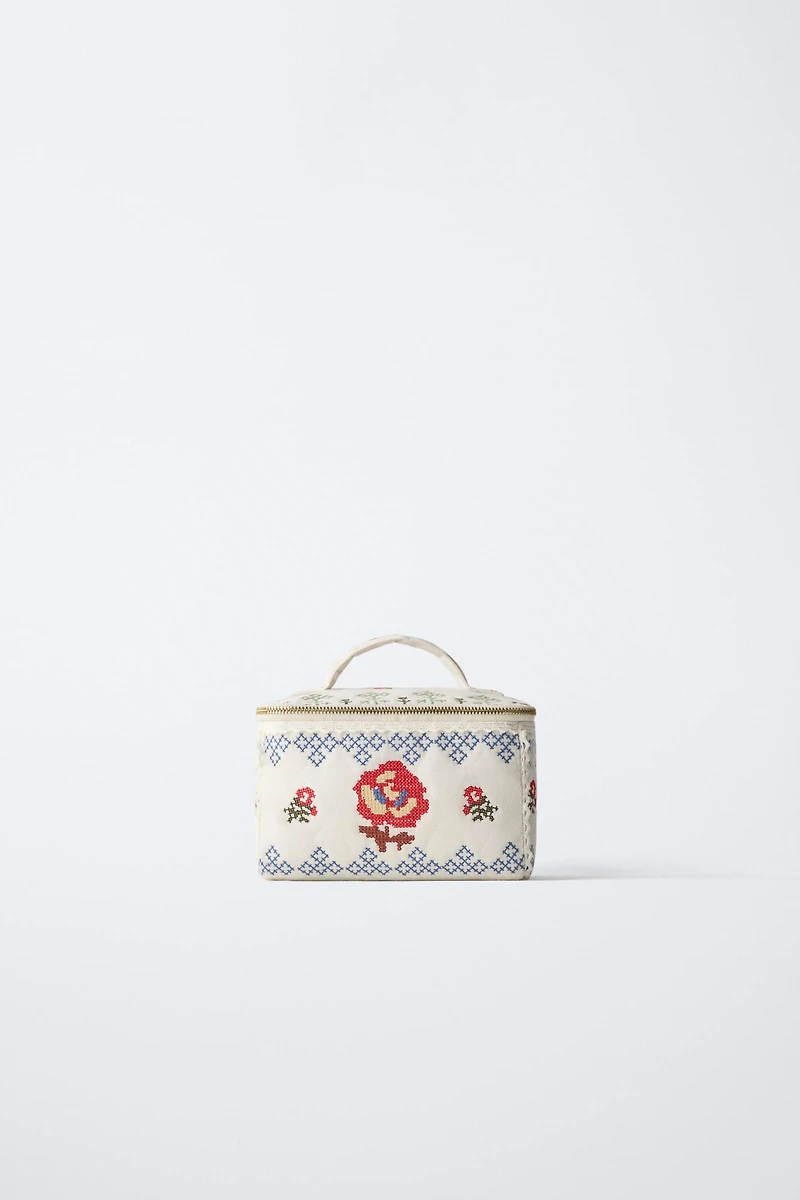 EMBROIDERED TOILETRY BAG