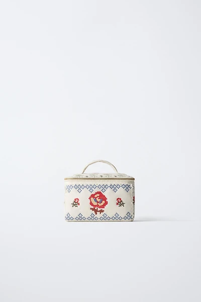 EMBROIDERED TOILETRY BAG