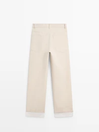 Jean straight revers dans le bas