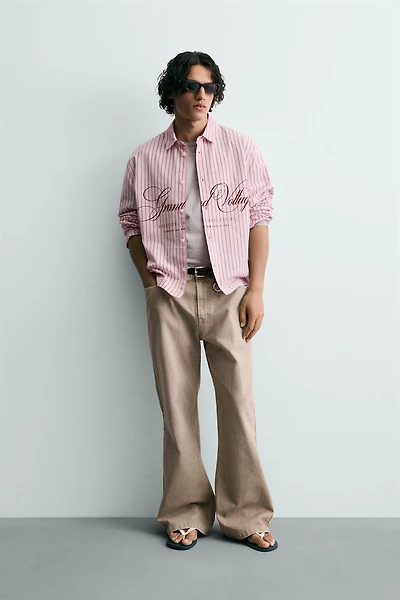 RELAXED FIT PLAID TEXT SHIRT