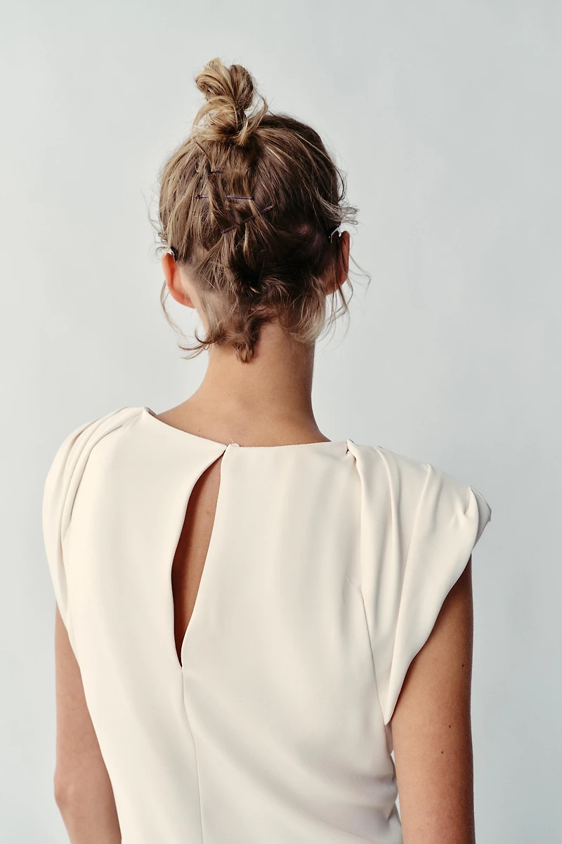 ASYMMETRIC SHORT DRESS WITH SHOULDER PADS