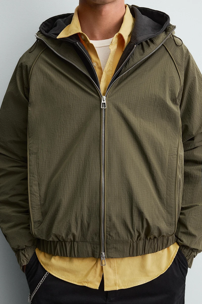 VESTE TECHNIQUE LÉGÈRE DÉPERLANTE