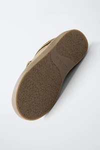 CHAUSSURES EN CUIR