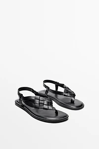Flat woven leather sandals