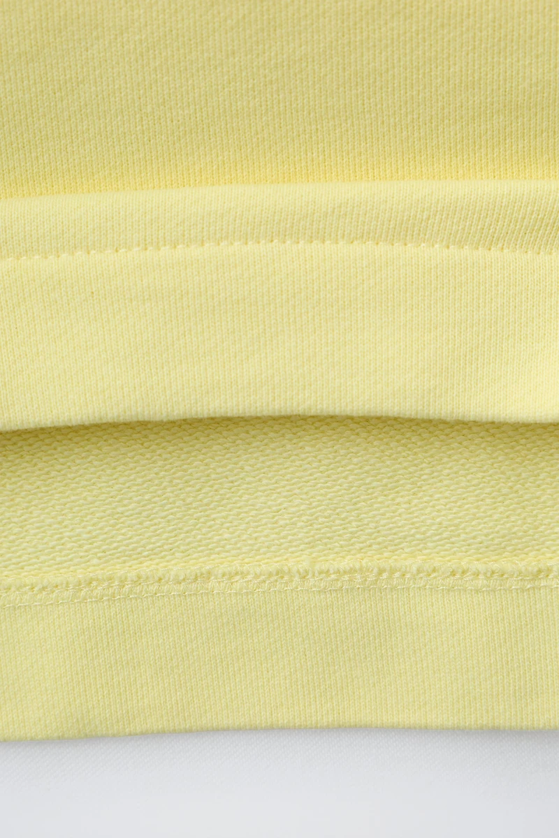 ENSEMBLE SWEAT ET BERMUDA À FLEUR GOMMÉE