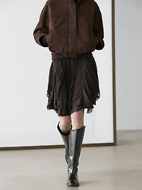 Asymmetric skirt with ruffles