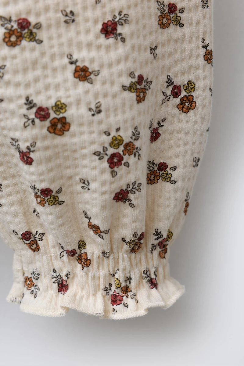 FLORAL EMBOSSED PANTS