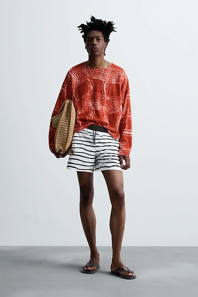 GRAPHIC PRINT SWEATER © OTIS KWAME KYE QUAICOE