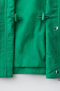 PARKA DÉPERLANTE À PLIS
