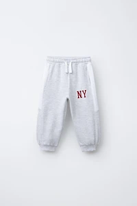 PANTALON DE JOGGING À BANDES LATÉRALES
