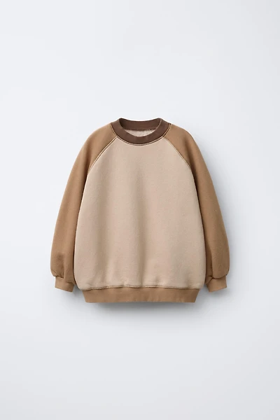 RAGLAN SLEEVE SWEATSHIRT