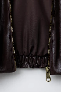 BLOUSON EN MATIÈRE SYNTHÉTIQUE