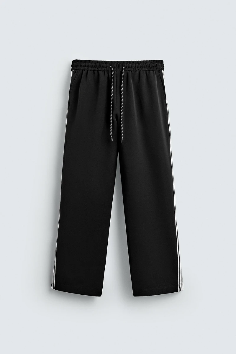 WIDE FIT JOGGER PANTS WITH SIDE STRIPES