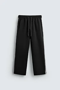WIDE FIT JOGGER PANTS WITH SIDE STRIPES