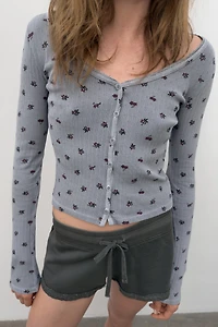 VESTE POINTELLE À FLEURS