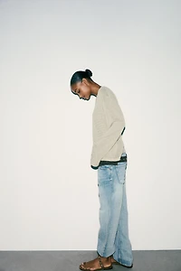 CUT-OUT KNIT SWEATER