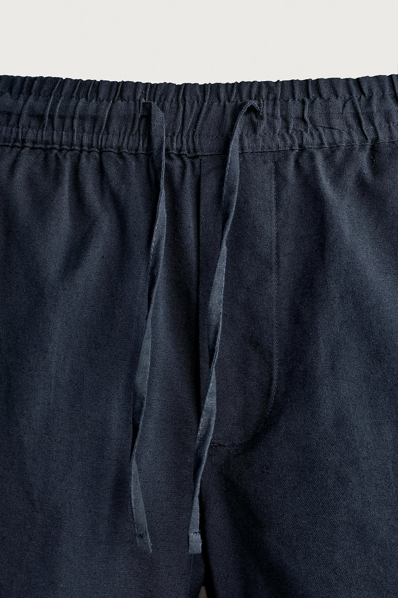 SHORT COURT BRODERIE POISSON