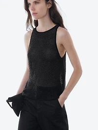 Top semi-transparent à perles fantaisie ton sur