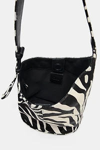 MINI SAC SEAU SOUPLE EN CUIR ASYMÉTRIQUE