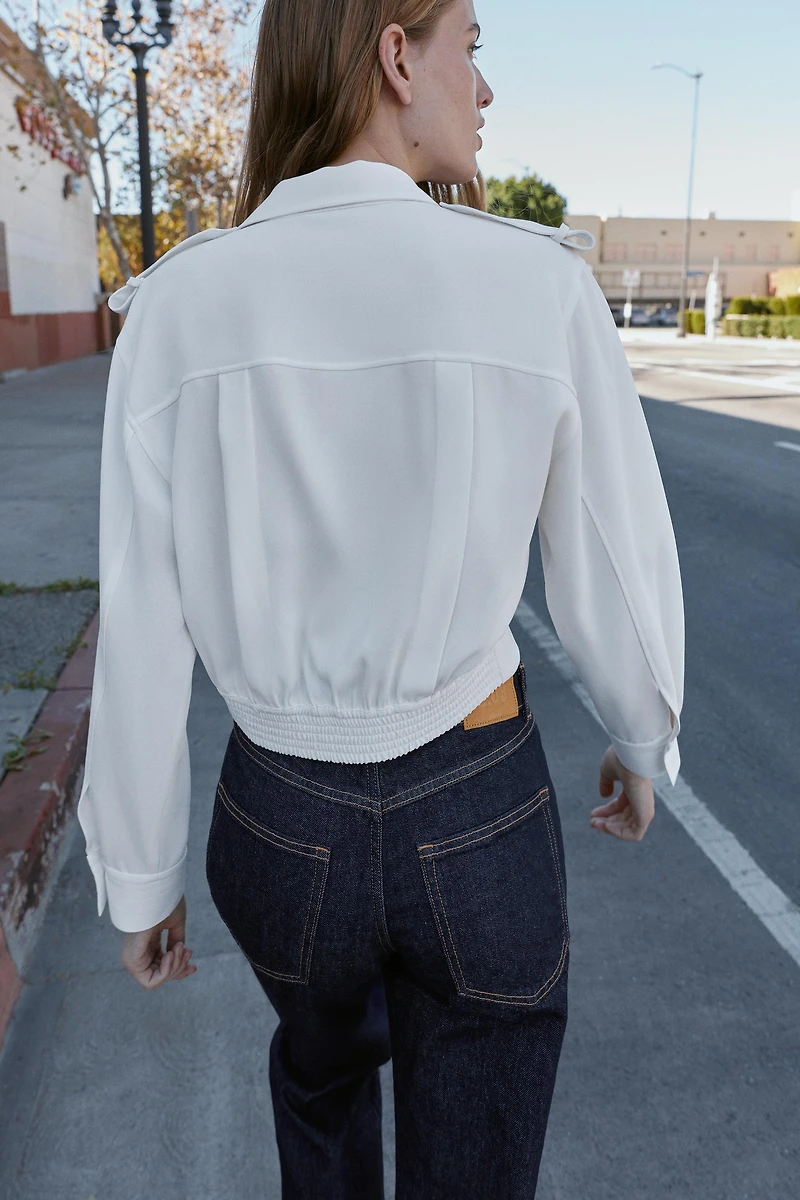 CHEMISE COURTE À PATTES D'ÉPAULES
