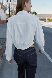 CHEMISE COURTE À PATTES D'ÉPAULES