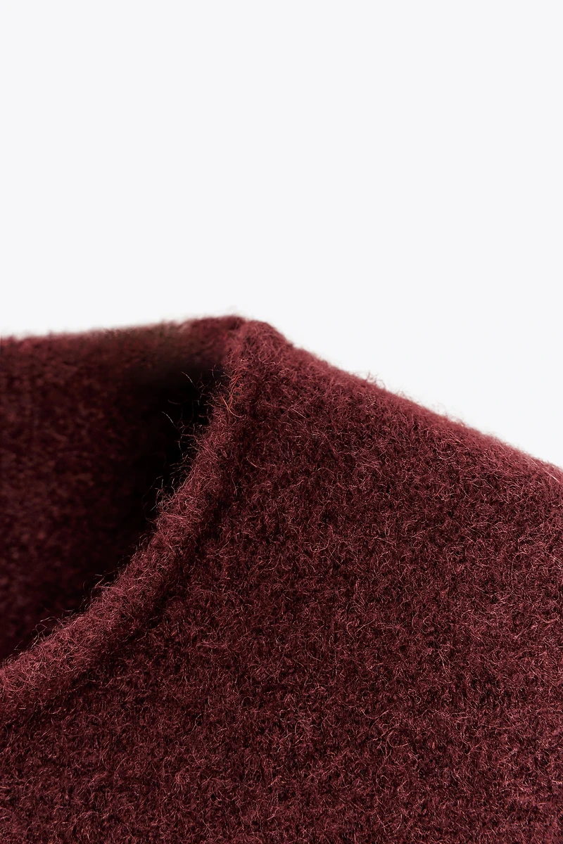 SHORT SLEEVE KNIT SWEATER