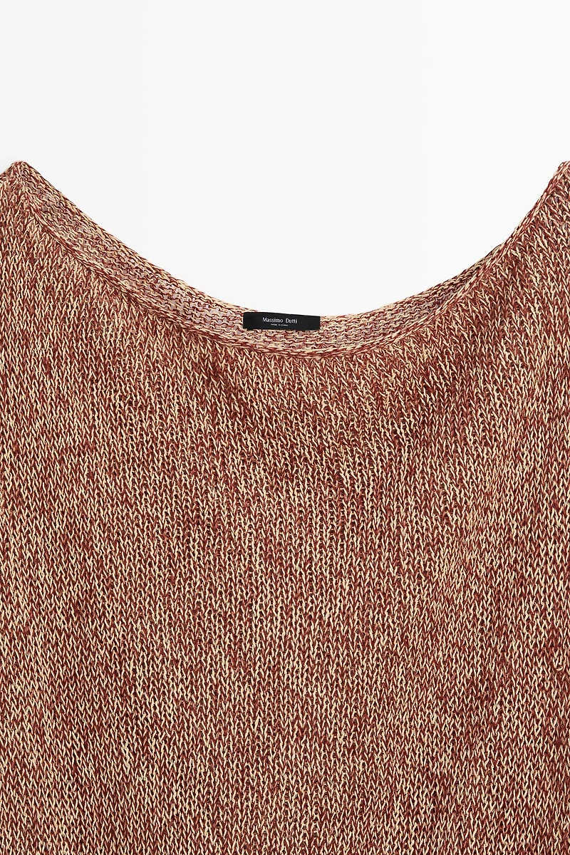 Cotton blend knit top with ribbed hem