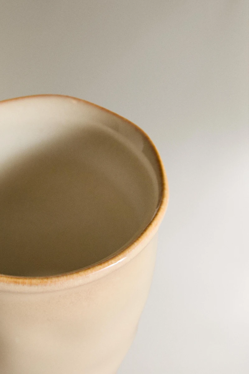 STONEWARE MUG WITH IRREGULAR EDGE