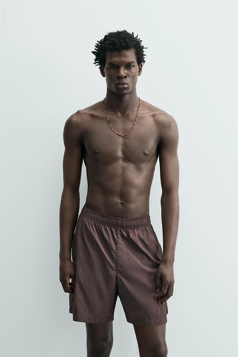 LONG CARGO SWIM TRUNKS