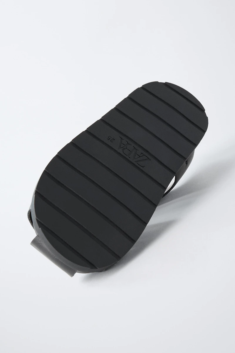 STRAPPY FISHERMAN SANDALS