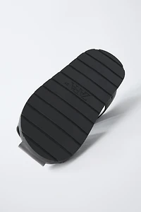 STRAPPY FISHERMAN SANDALS
