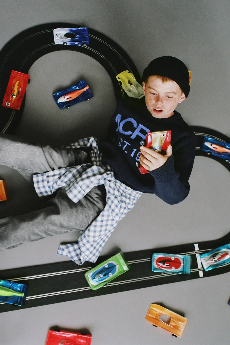 PULL EN MAILLE JACQUARD À INSCRIPTION