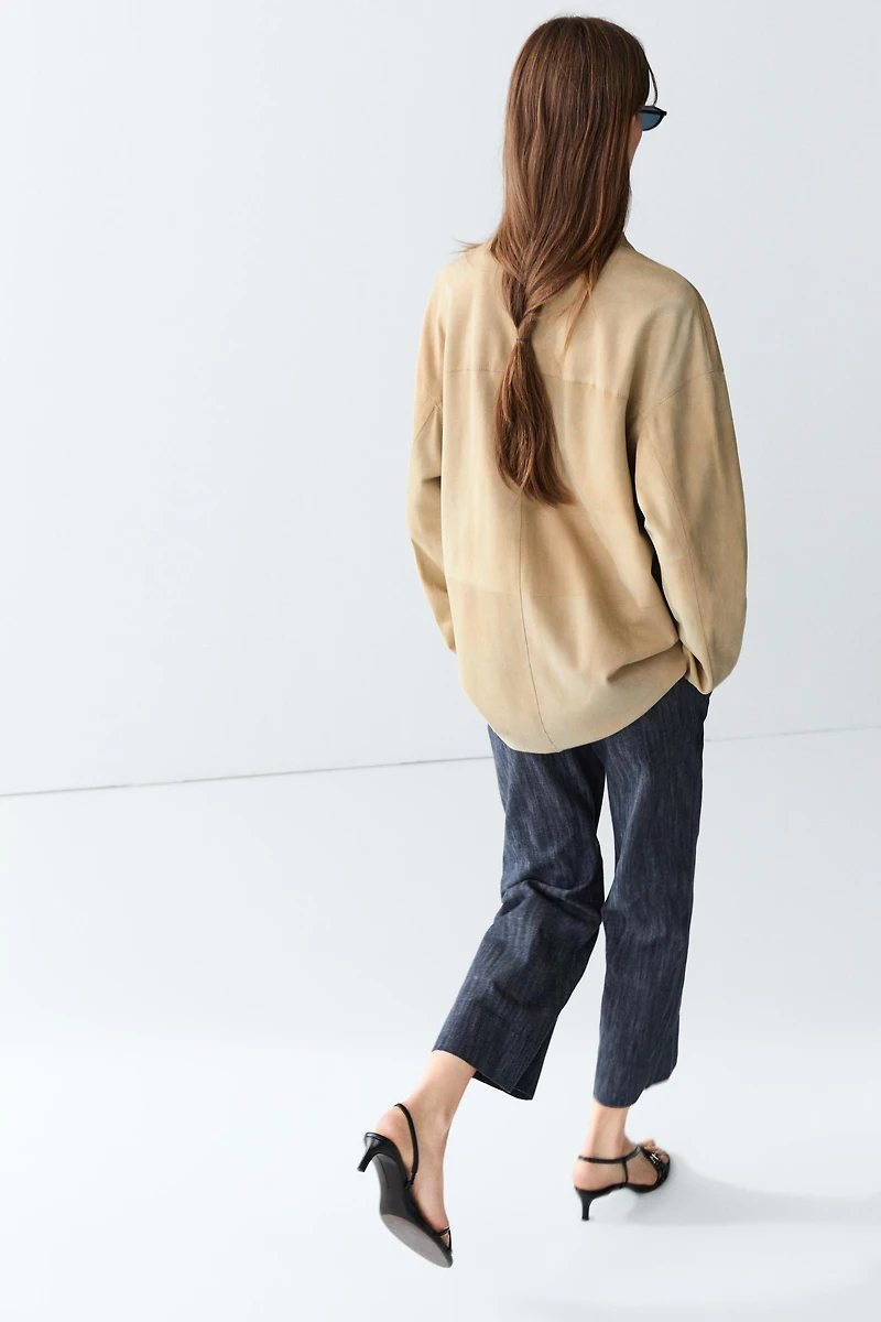 Blazer à poches en cuir velours