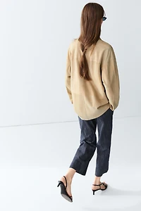 Blazer à poches en cuir velours