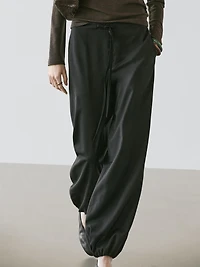 Wool sarouel trousers with tie detail
