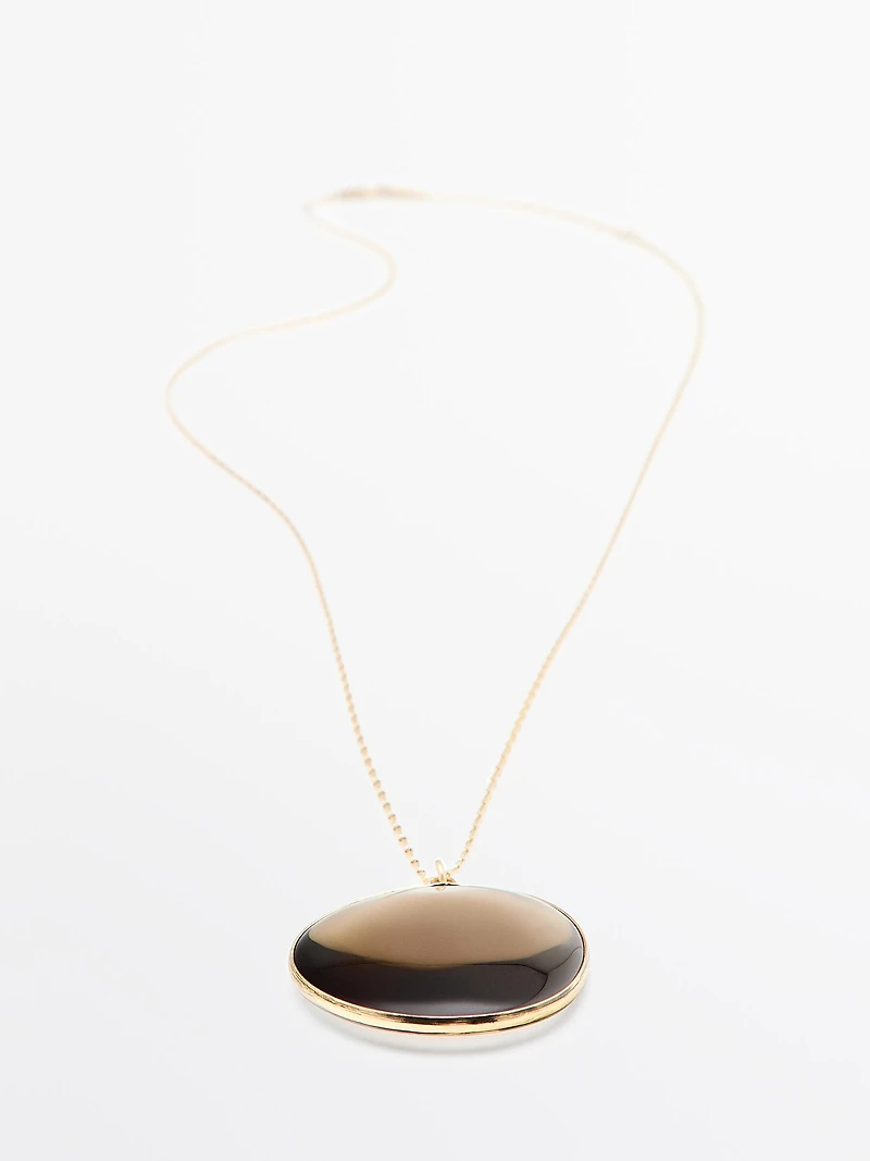 Necklace with translucent stone pendant