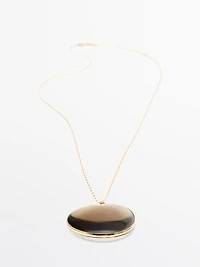 Necklace with translucent stone pendant