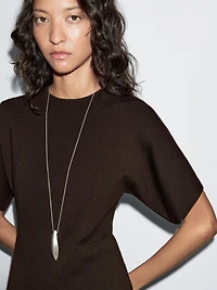 Knit dress with contrast gathered detail