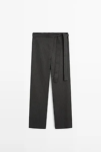 Striped trousers with wrap-style bow detail
