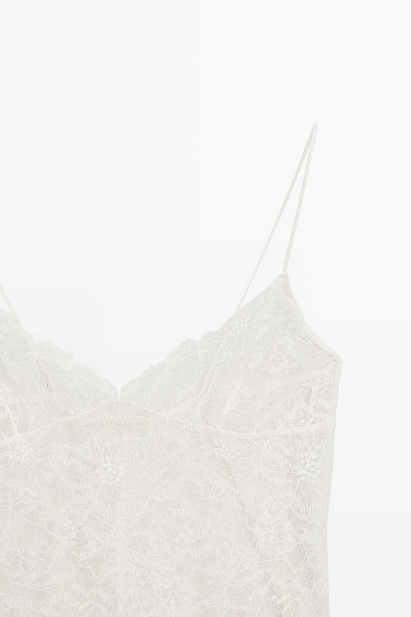 Top à bretelles en dentelle florale