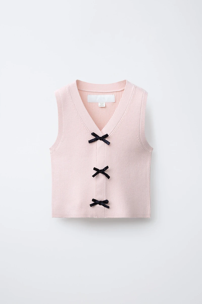 GILET EN MAILLE À NŒUDS