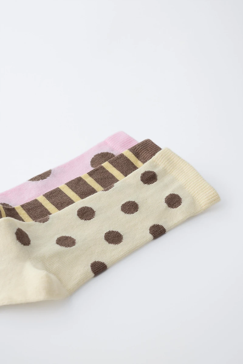 THREE-PACK OF LONG STRIPED AND POLKA DOT SOCKS