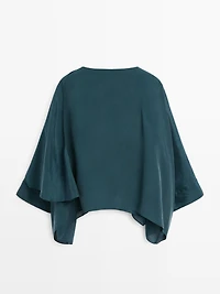 Flowing cape-style blouse