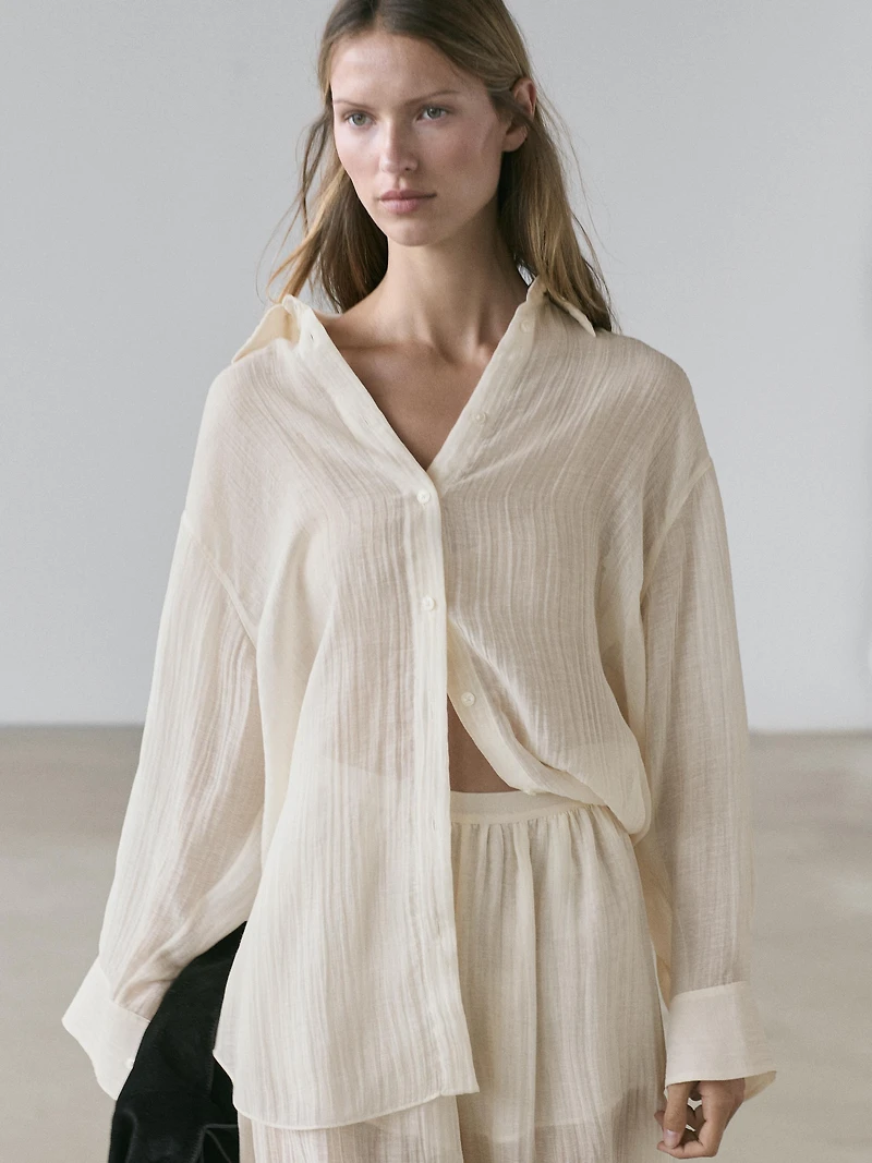 Flowing shirt with pleated detail