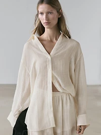 Flowing shirt with pleated detail