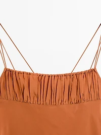Flowing top with draped detail