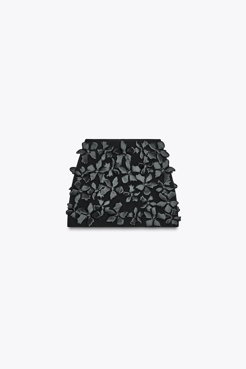 FLORAL STRUCTURE KNIT MINI SKIRT